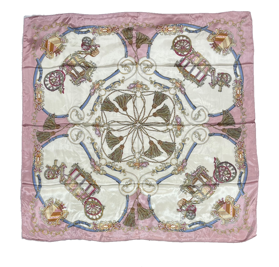 A luxurious 35" x 35" multi-purpose scarf made of soft polyester, styled elegantly as a hair scarf.