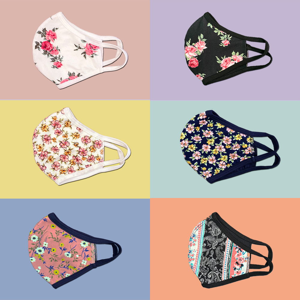 Pack of 25 floral fabric face masks featuring vibrant designs, made from a heavy cotton blend for comfort and durability.