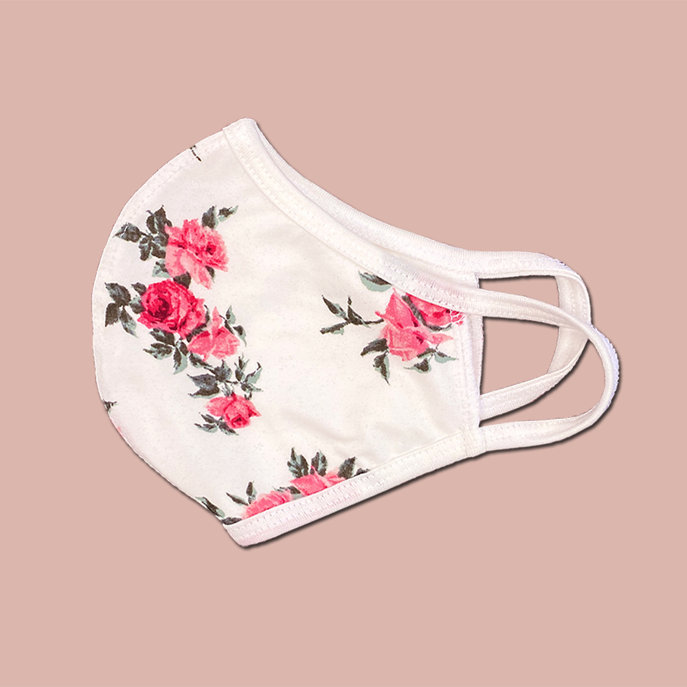 Pack of 25 floral fabric face masks featuring vibrant designs, made from a heavy cotton blend for comfort and durability.