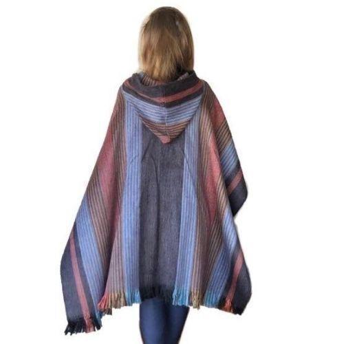 A beautifully crafted Six Band Alpaca Poncho featuring intricate patterns of colored bands, showcasing a blend of soft alpaca wool and acrylic.