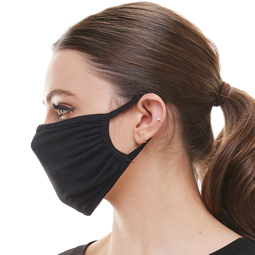 Solid black washable reusable fabric face mask with elastic ear bands, made from heavy cotton blend, designed for comfort and full coverage.