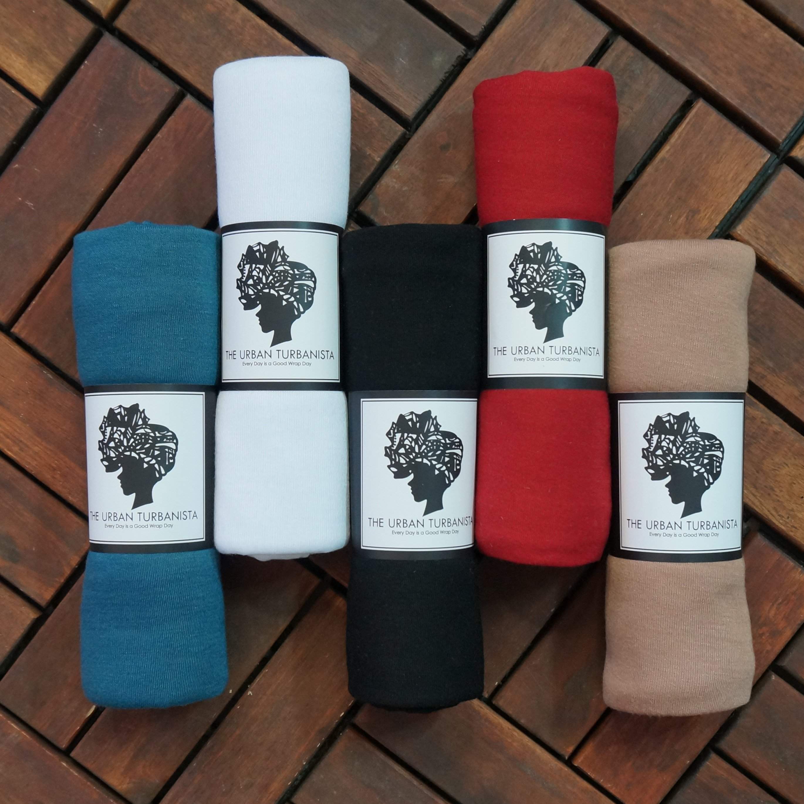 Black Stretch Jersey Knit African HeadWrap, showcasing its soft fabric and versatile design, perfect for various styling options.