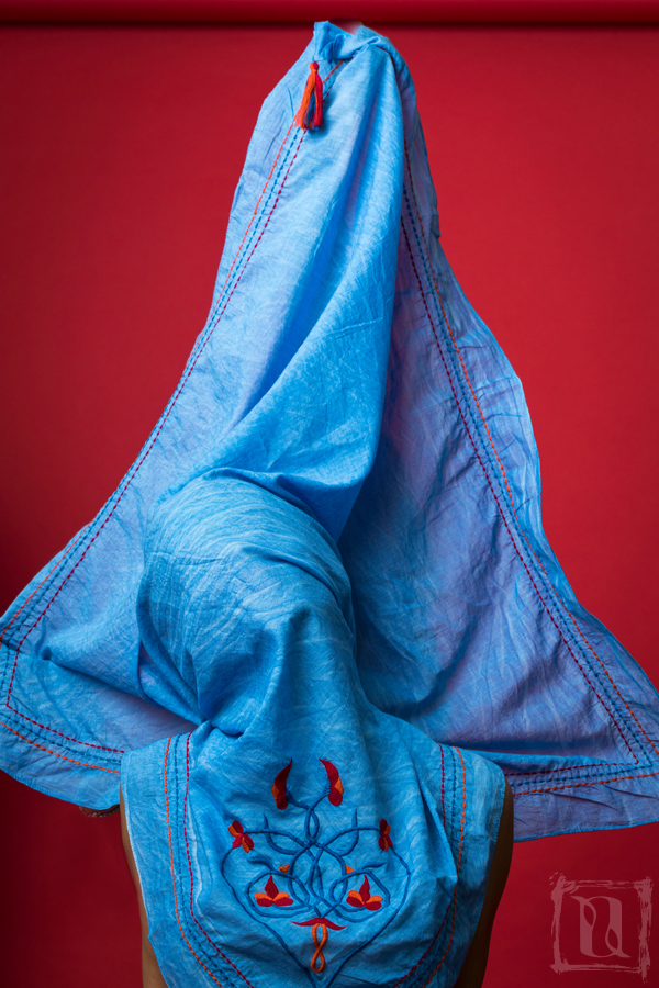 'The Knot' Cotton Scarf featuring heart and floral embroidery in red, blue, and orange colors, elegantly displayed in a gift box.