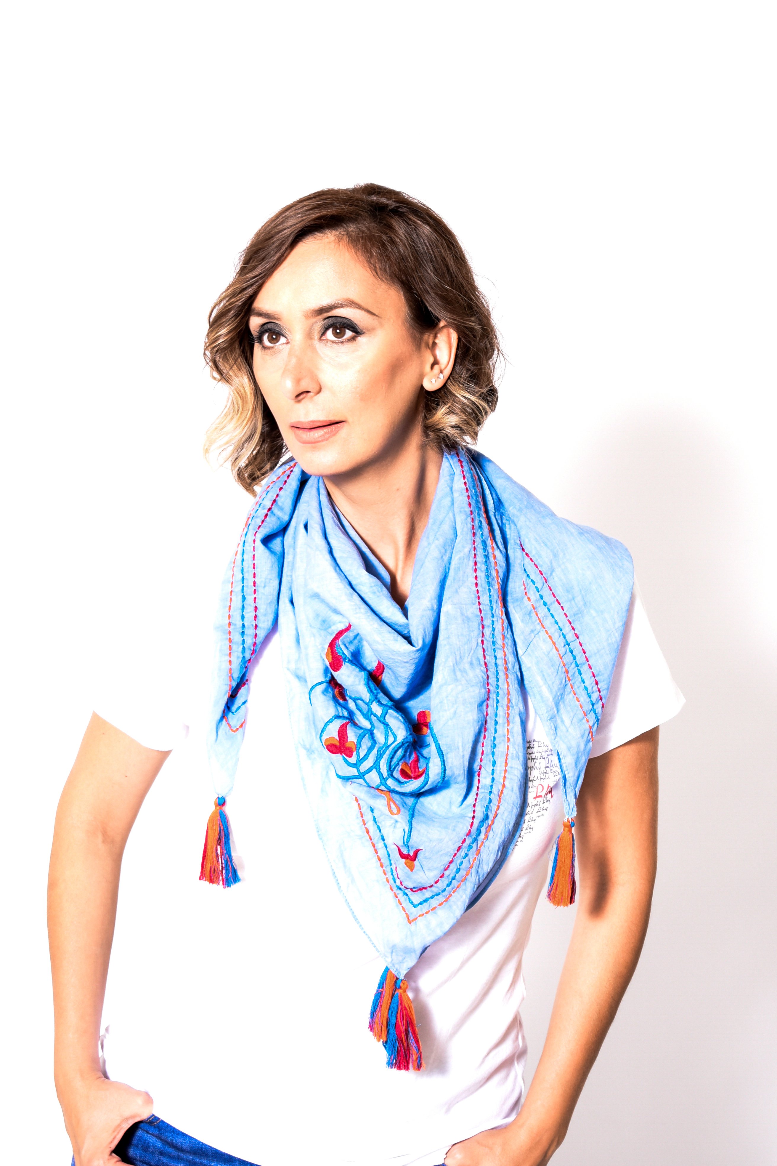 'The Knot' Cotton Scarf featuring heart and floral embroidery in red, blue, and orange colors, elegantly displayed in a gift box.