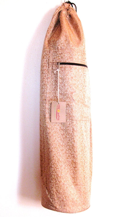 OMsutra Saree Fabric Yoga Bag featuring a unique paisley design in cotton and silk, with zippered pockets and adjustable strap.