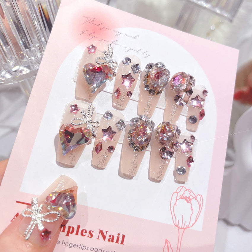A set of 24 sparkling gem fake nails displayed in an elegant arrangement, showcasing their vibrant colors and dazzling designs.