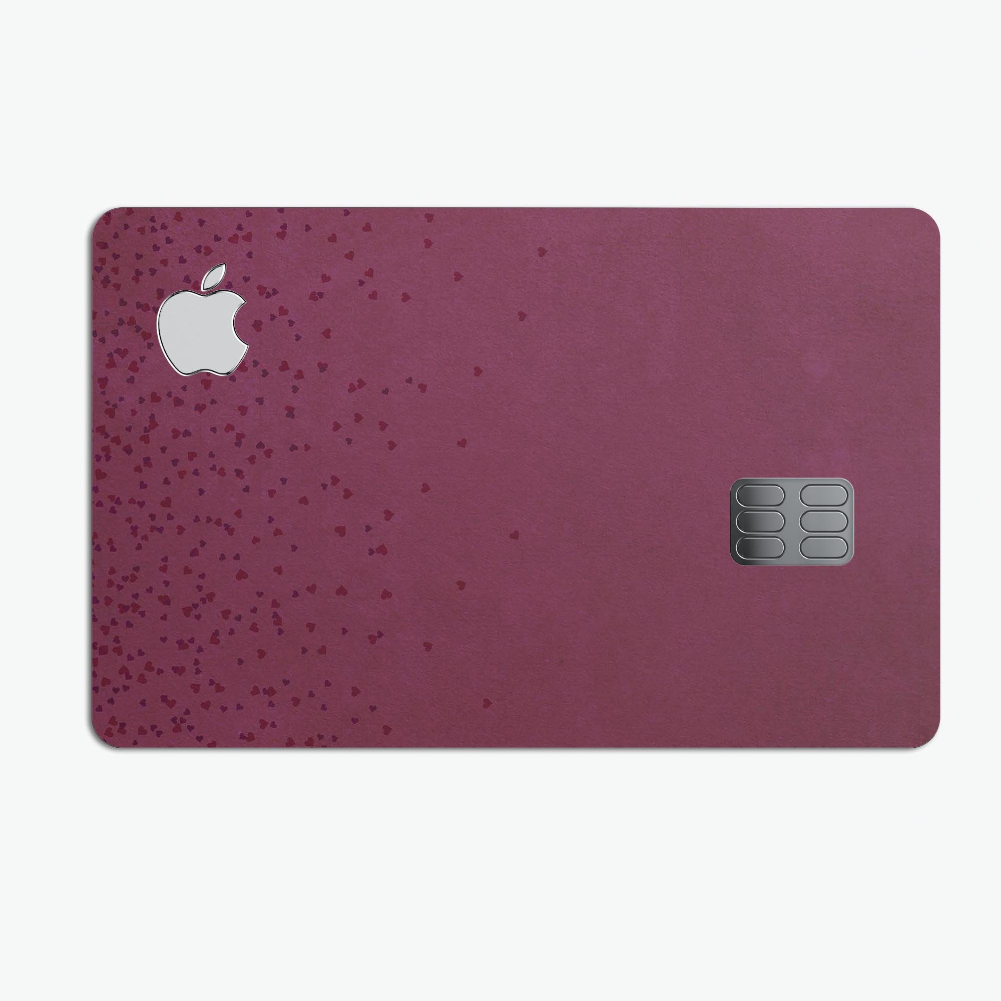 50 Shades of Burgundy Micro Hearts decal skin for Apple Card, showcasing a stylish design with micro heart patterns.