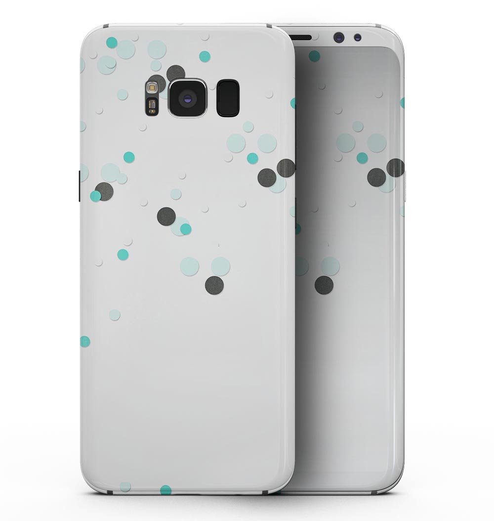 Samsung Galaxy S8 with Abstract Scattered Black and Teal Dots skin, showcasing a stylish design that protects the device.