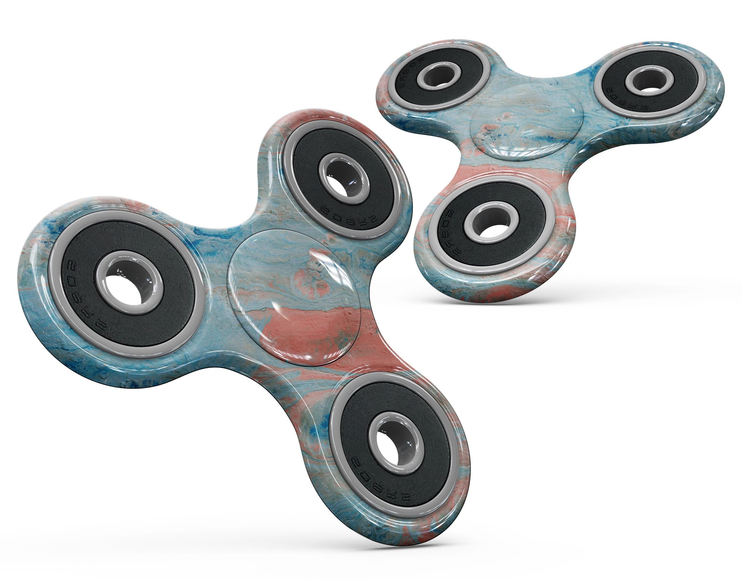 Abstract Wet Paint Coral Blues Full-Body Skin-Kit for fidget spinner, showcasing vibrant colors and a sleek design.