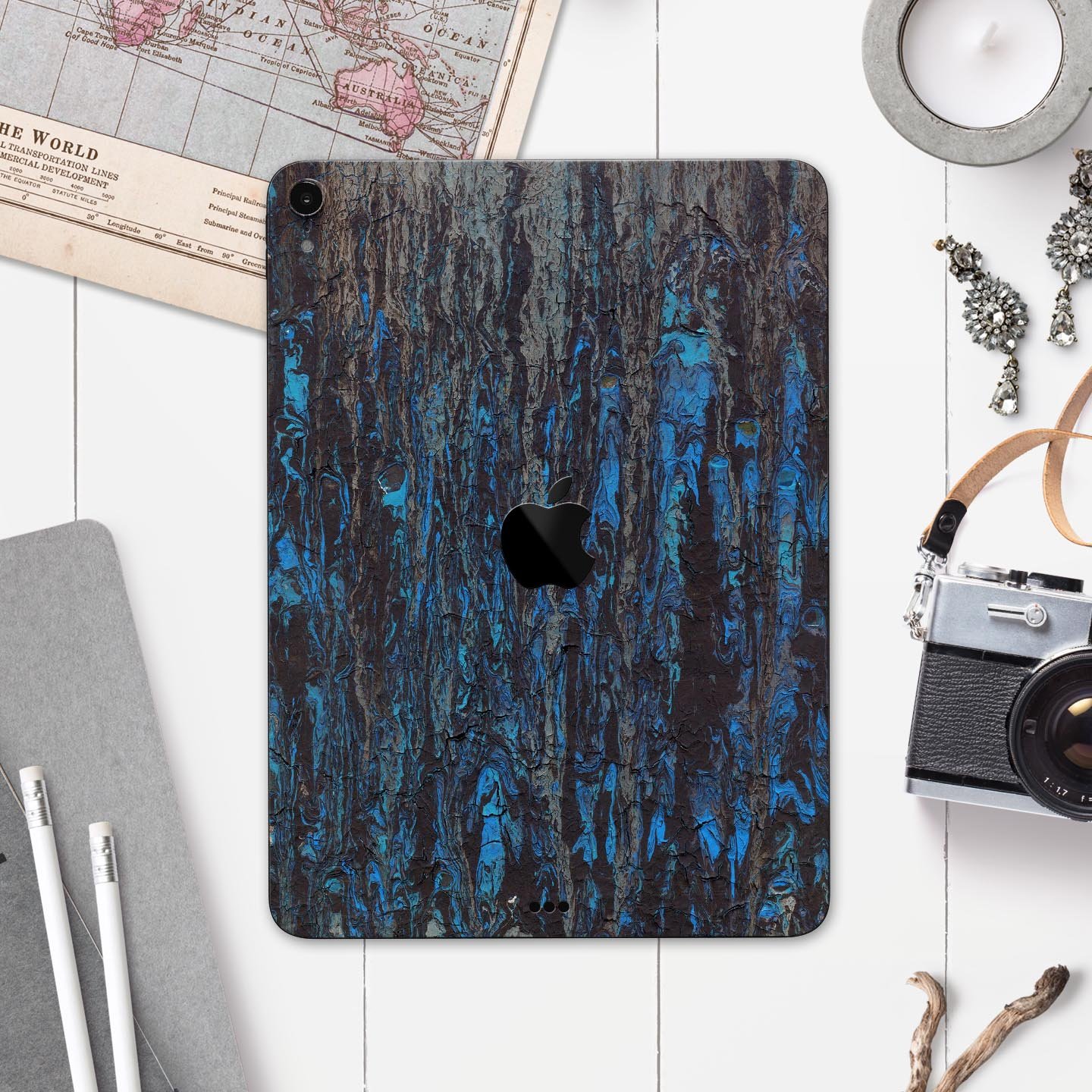 Abstract Wet Paint Dark Blues v2 skin decal for Apple devices, showcasing a vibrant abstract design with dark blue tones.