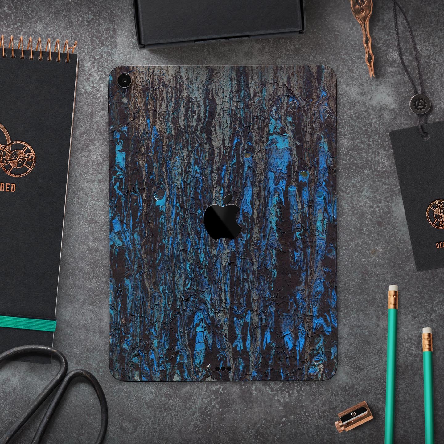 Abstract Wet Paint Dark Blues v2 skin decal for Apple devices, showcasing a vibrant abstract design with dark blue tones.