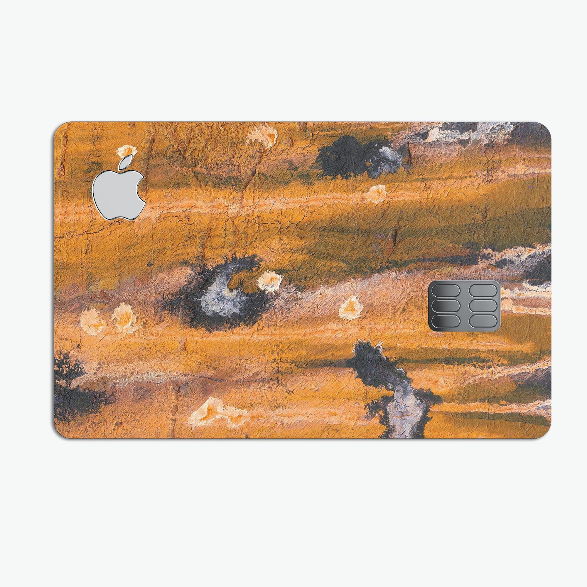Abstract Wet Paint Dark Gold skin for Apple Card, showcasing premium vinyl design and protective features.