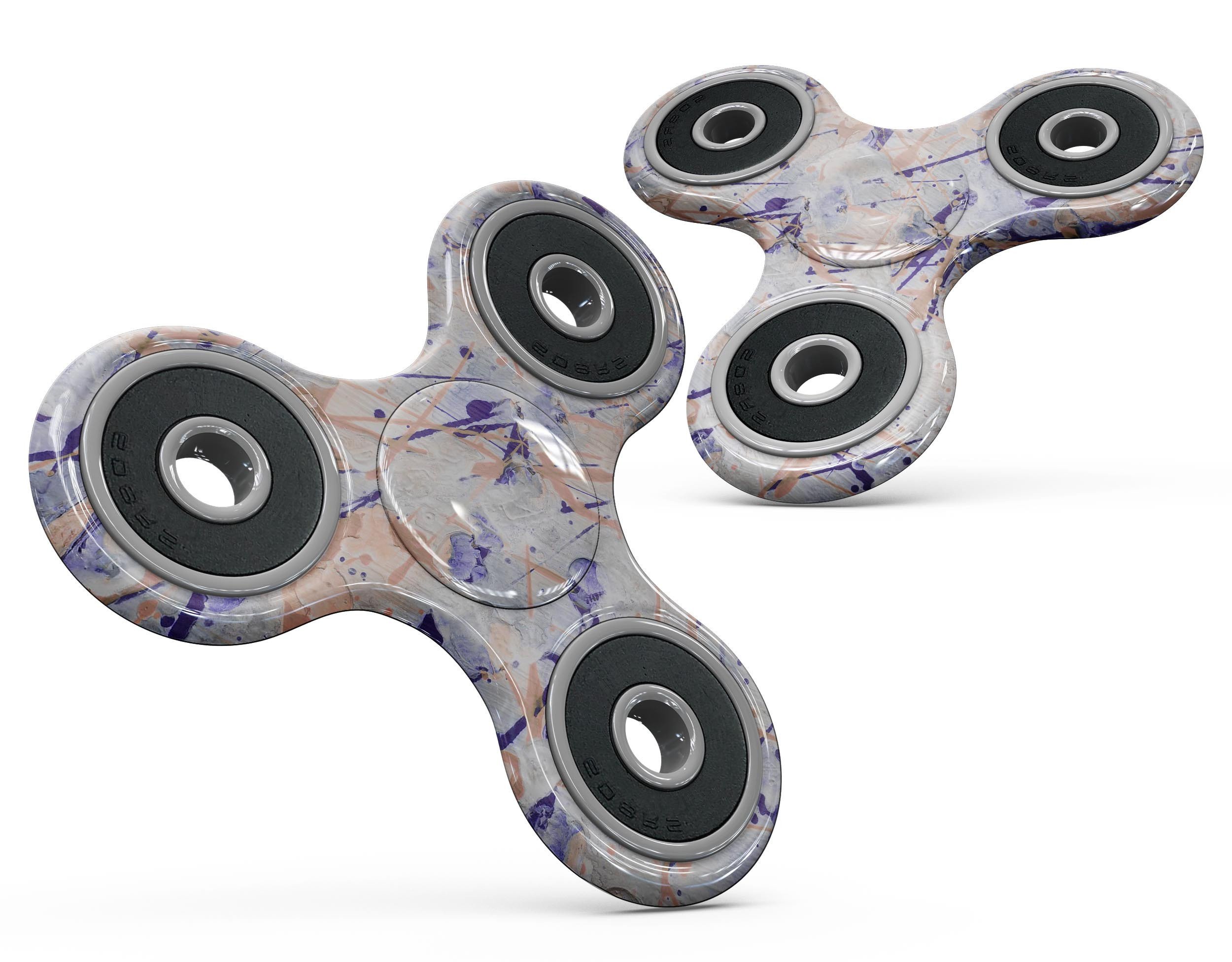 Abstract Wet Paint Pale Full-Body Fidget Spinner Skin-Kit showcasing vibrant colors and unique design for personalization.