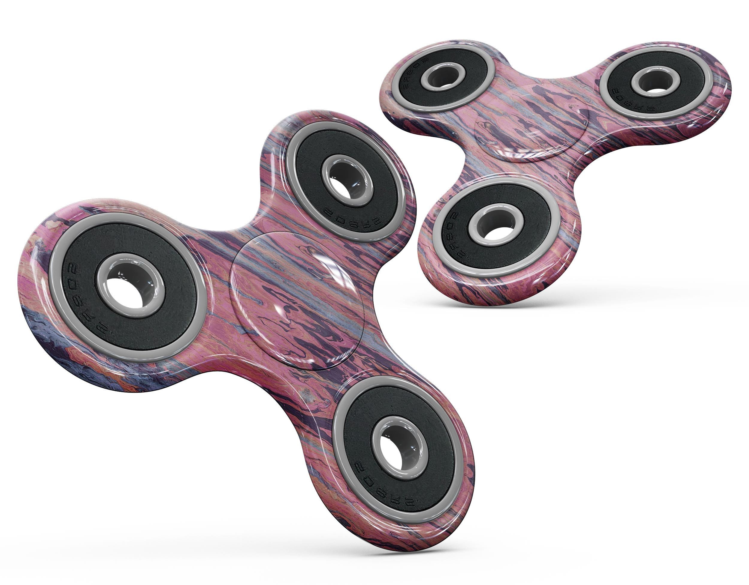 Abstract Wet Paint Pink Skin-Kit for fidget spinner, showcasing vibrant colors and unique design.