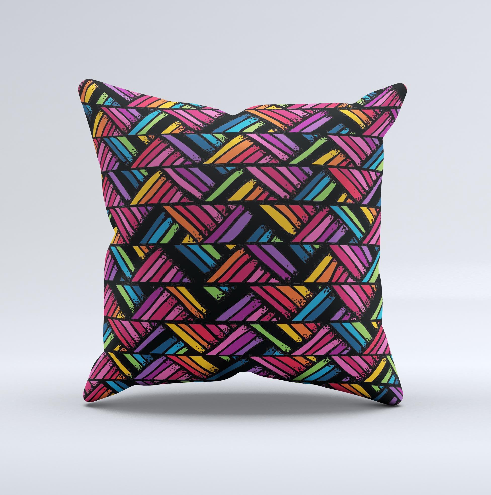 A vibrant decorative throw pillow featuring an abstract zig zag color pattern, handcrafted in Virginia with high-quality materials.