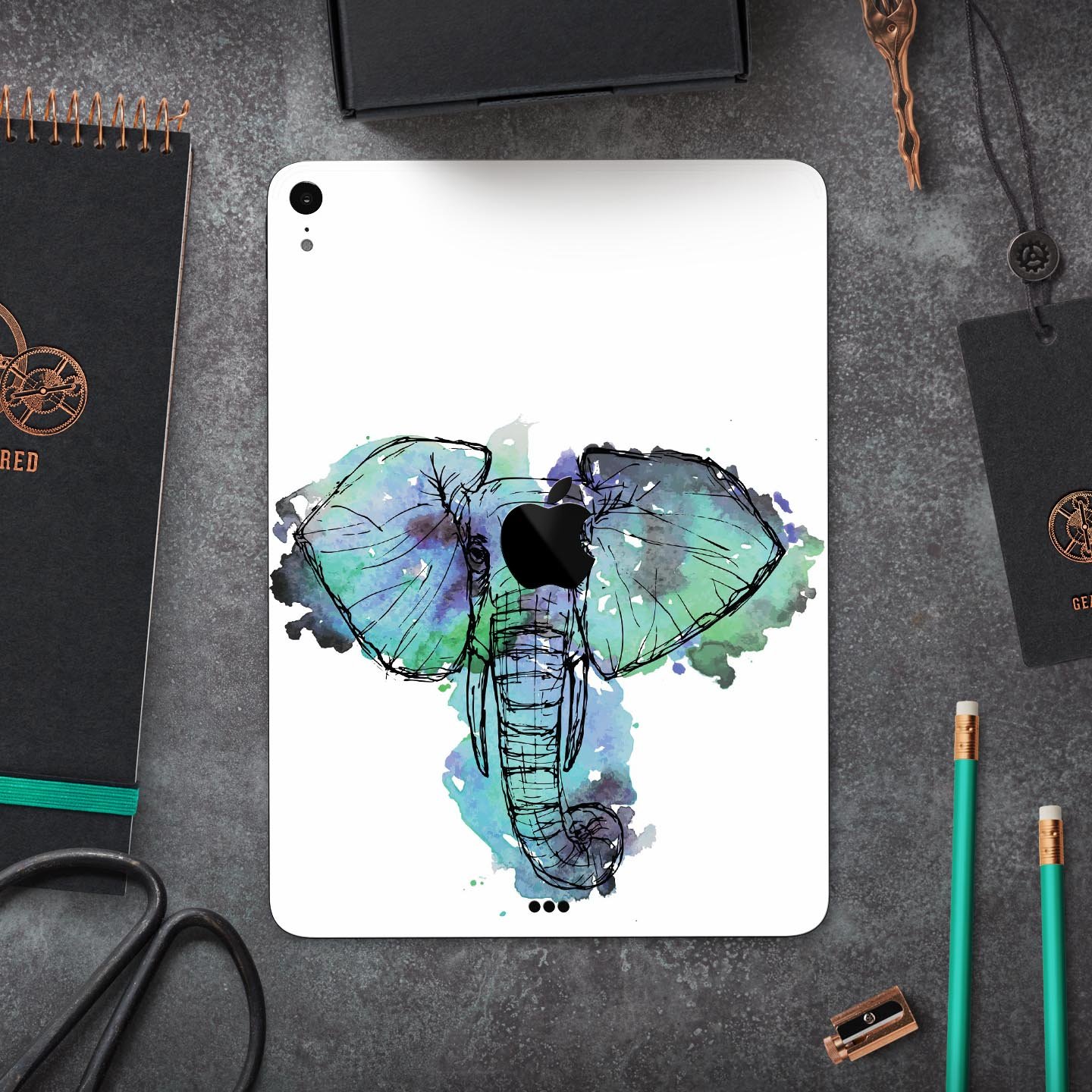 African Sketch Elephant skin decal for Apple iPad Pro, showcasing intricate elephant artwork on a protective layer.