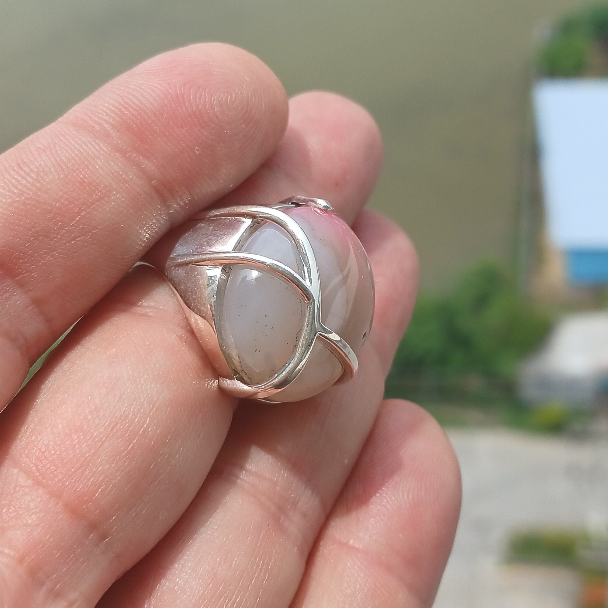 Artistic Agate Silver Ring featuring an oval-shaped white and pink Agate Cabochon set in polished sterling silver.