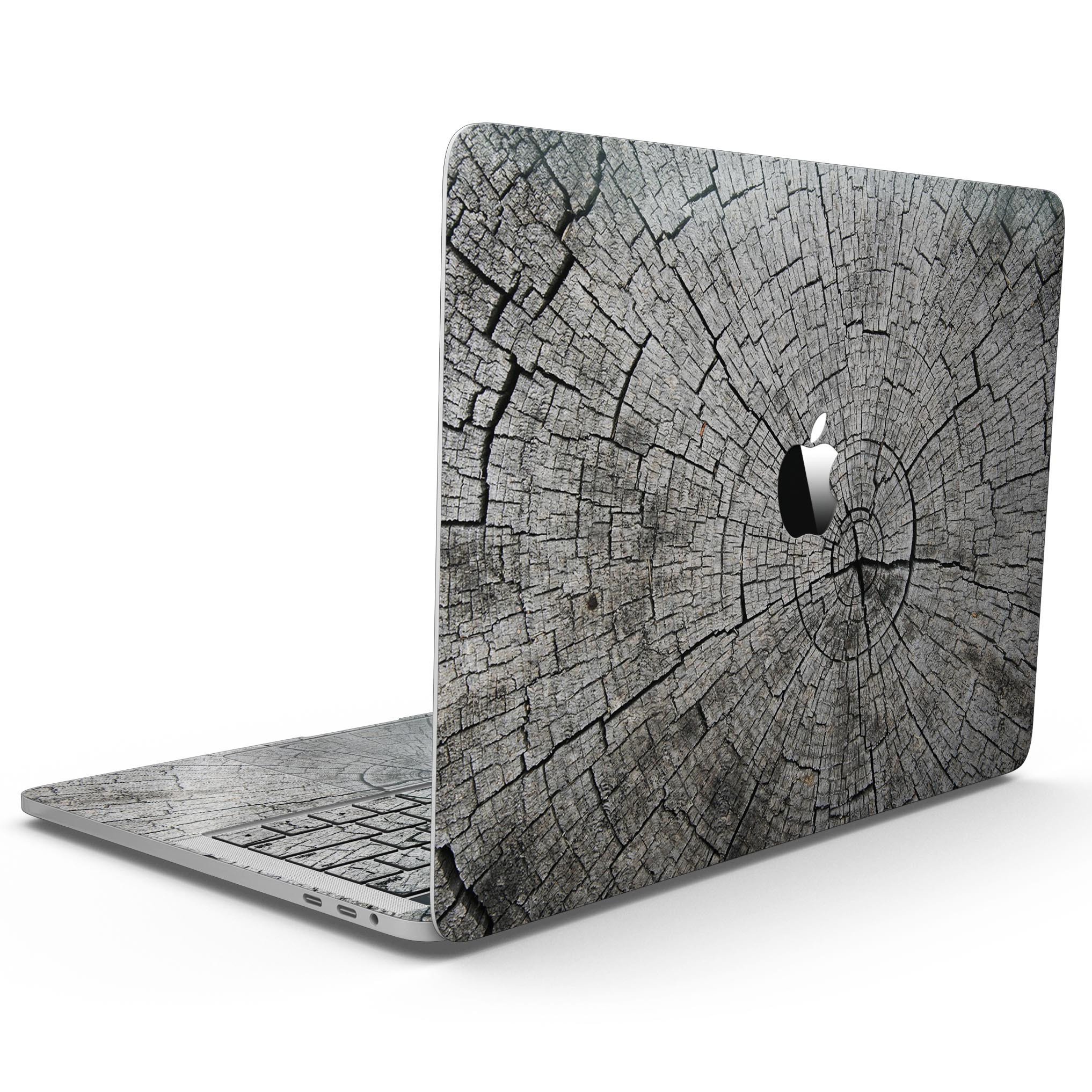 Aged Cracked Tree Stump Core Skin Kit for MacBook Pro with Touch Bar, showcasing a stylish design and premium vinyl material.