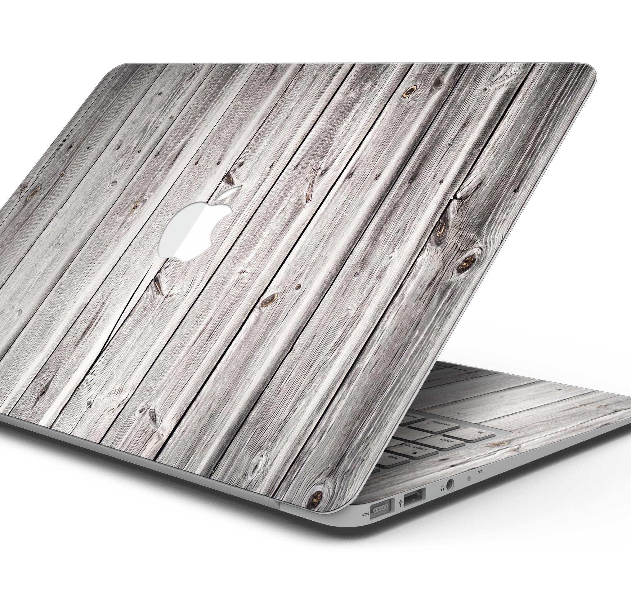 Aged White Wood Planks skin decal wrap kit for MacBook, showcasing a stylish wood texture design.