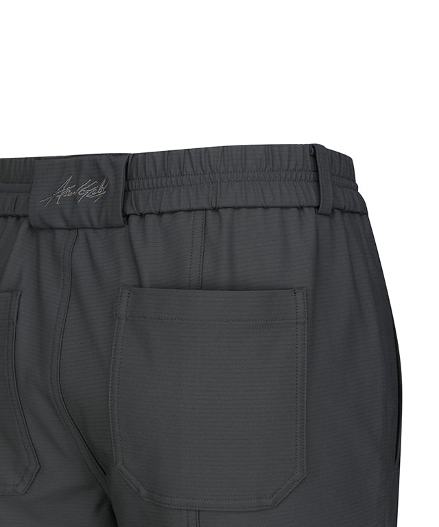 ANEW Golf Men Cago Jogger L/PT in Dark Gray, featuring a stylish diagonal pattern and shibori detailing at the back hem.