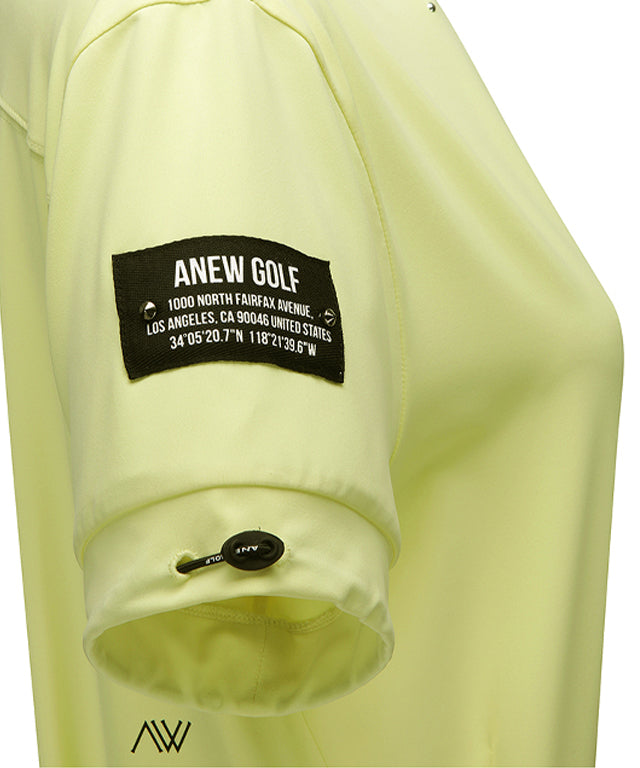Yellow ANEW Golf Women's Beads Point Crop Short Sleeve T-Shirt with unique bead design and adjustable sleeves.