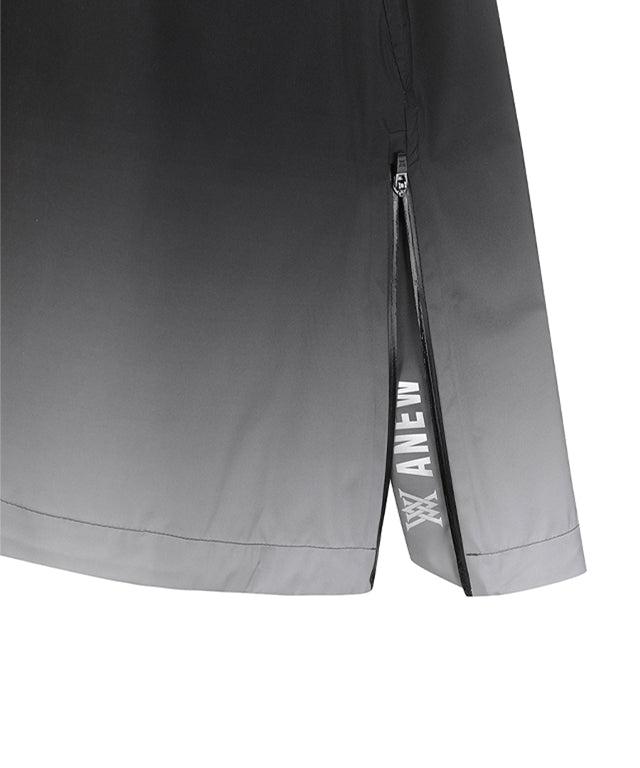 ANEW Golf Women's Gradation Long Rain Jacket in Black, featuring detachable sleeves and a stylish design.