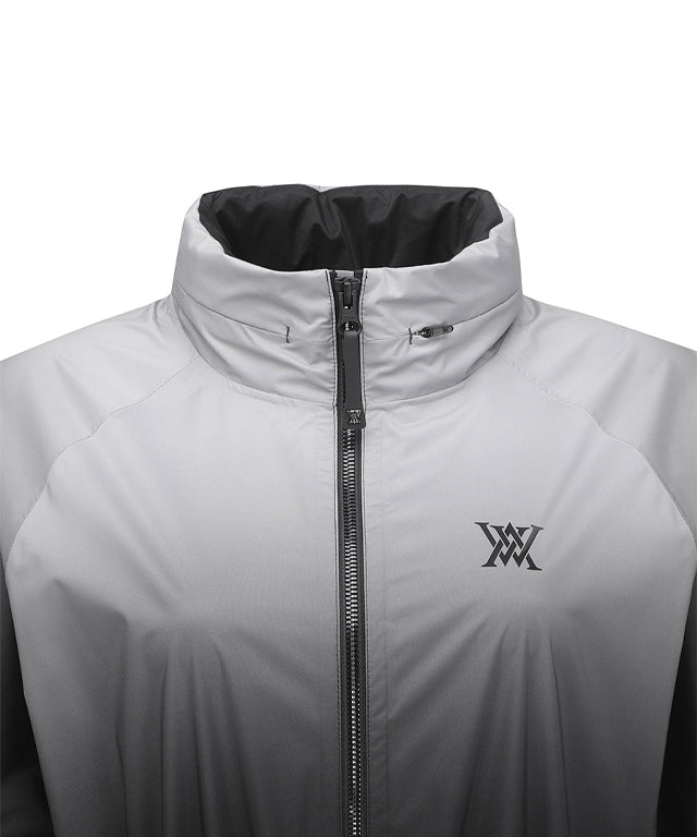 ANEW Golf Women's Gradation Long Rain Jacket in Black, featuring detachable sleeves and a stylish design.