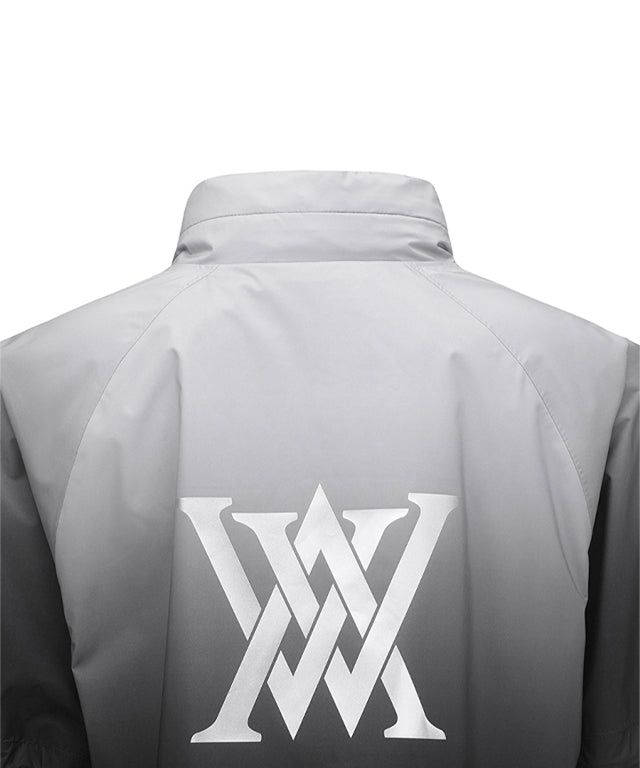 ANEW Golf Women's Gradation Long Rain Jacket in Black, featuring detachable sleeves and a stylish design.