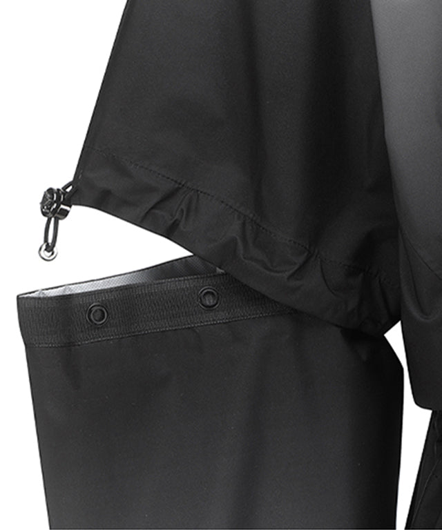 ANEW Golf Women's Gradation Long Rain Jacket in Black, featuring detachable sleeves and a stylish design.