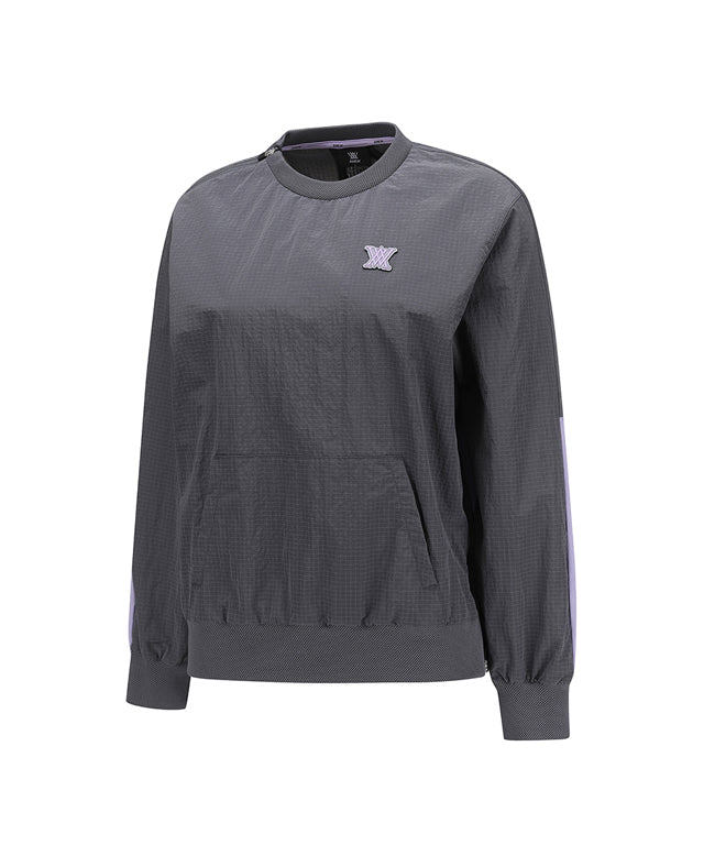 ANEW Golf Women Ribbed Color Block Anorak in Charcoal Gray with lavender accents, showcasing a stylish and functional design.