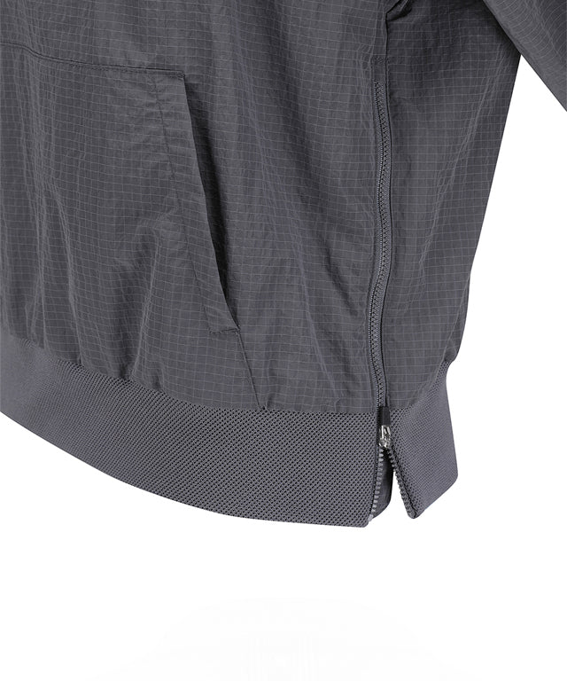 ANEW Golf Women Ribbed Color Block Anorak in Charcoal Gray with lavender accents, showcasing a stylish and functional design.