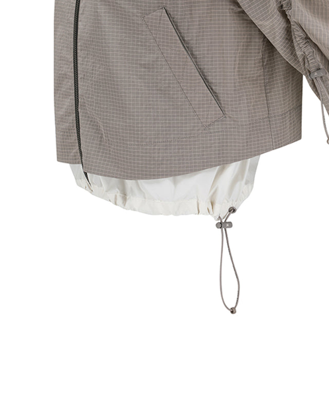 ANEW Golf Women's Ribstop Hoody Windbreaker Jacket in a stylish design, featuring a visor hood and adjustable drawstrings.