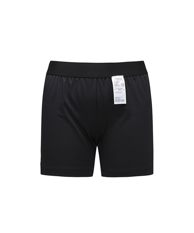 ANEW Golf Women Shoulder Control Band Flaer Lon in Khaki, showcasing adjustable suspender-style design and wide flare bottom.