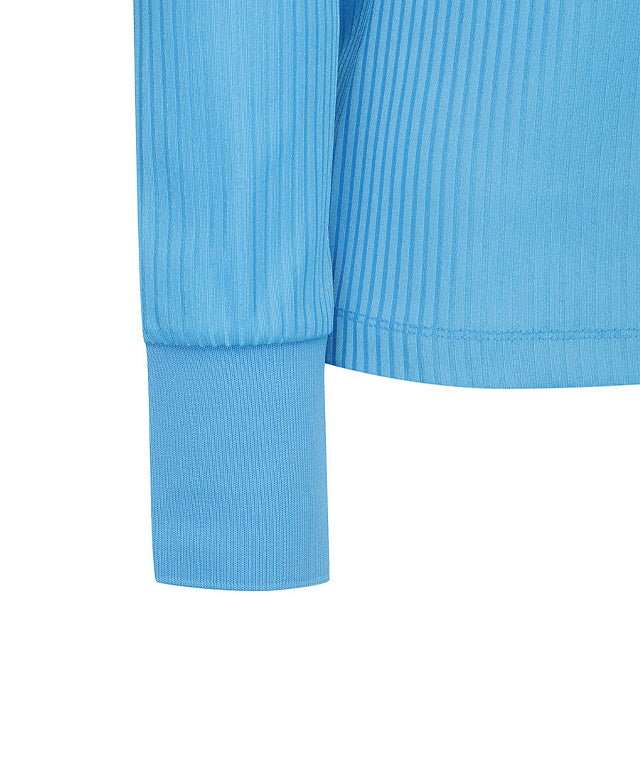 Light blue women's long t-shirt with zipper and ribbed design, perfect for golf and casual wear.