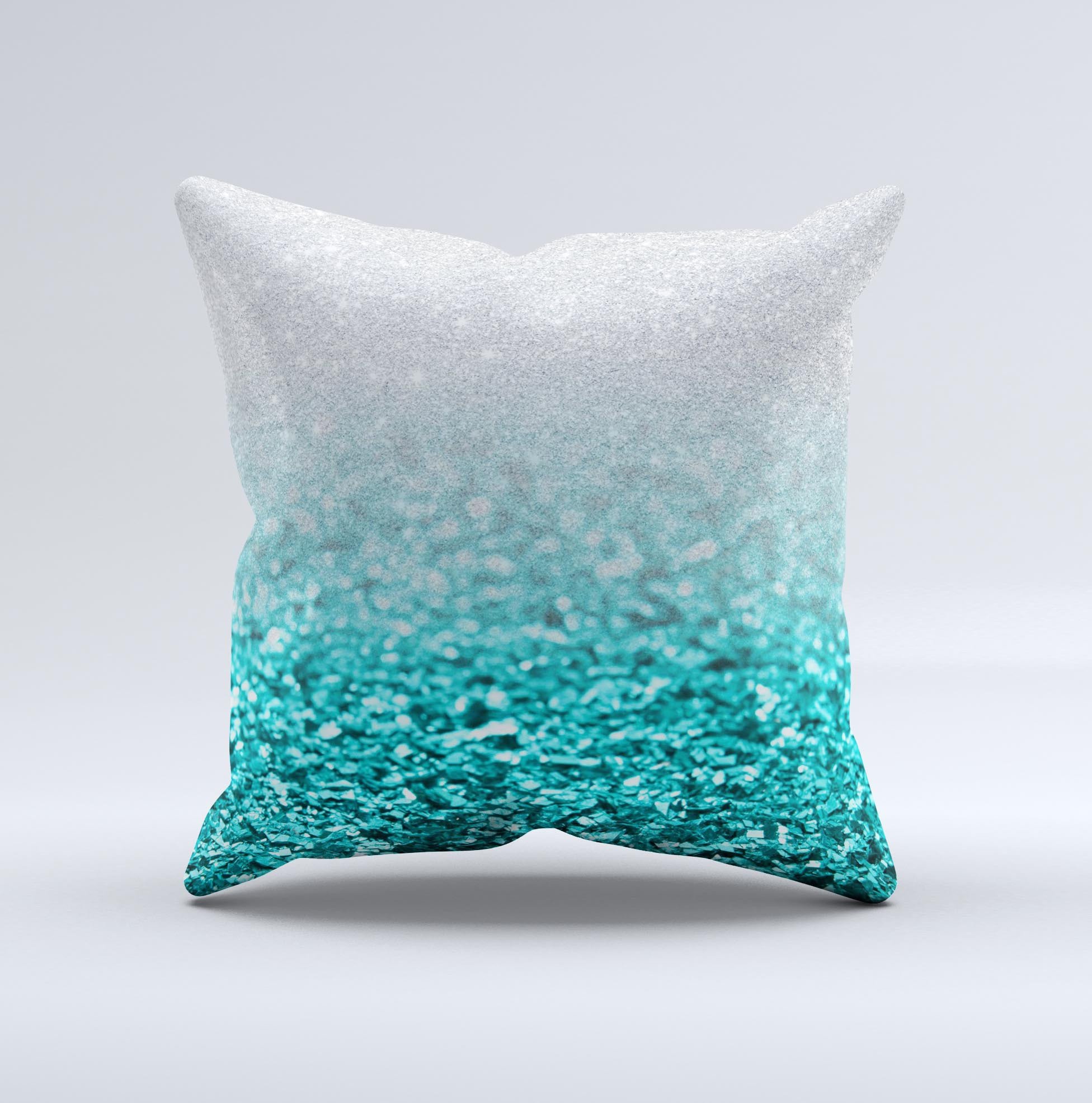 Aqua Blue and Silver Glimmer Fade decorative throw pillow, showcasing a unique hand-crafted design with a soft texture.