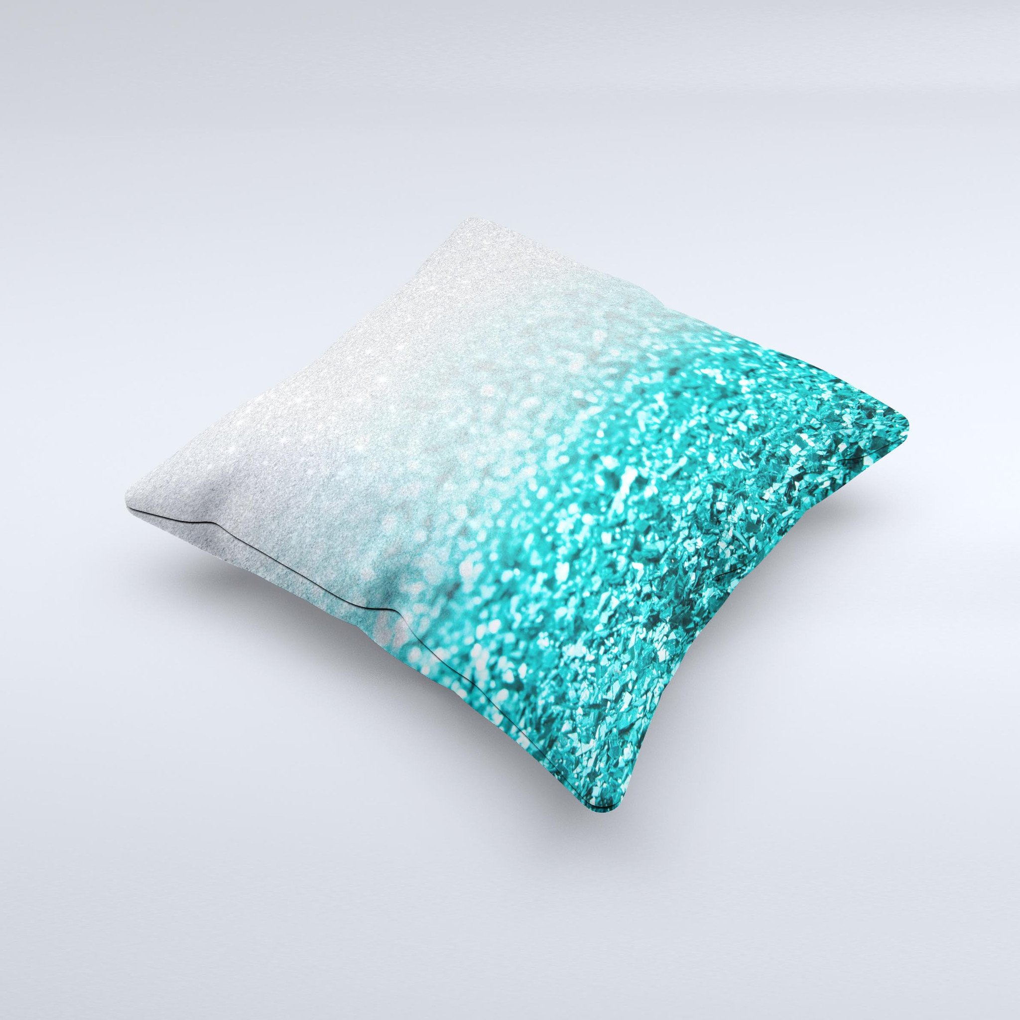 Aqua Blue and Silver Glimmer Fade decorative throw pillow, showcasing a unique hand-crafted design with a soft texture.