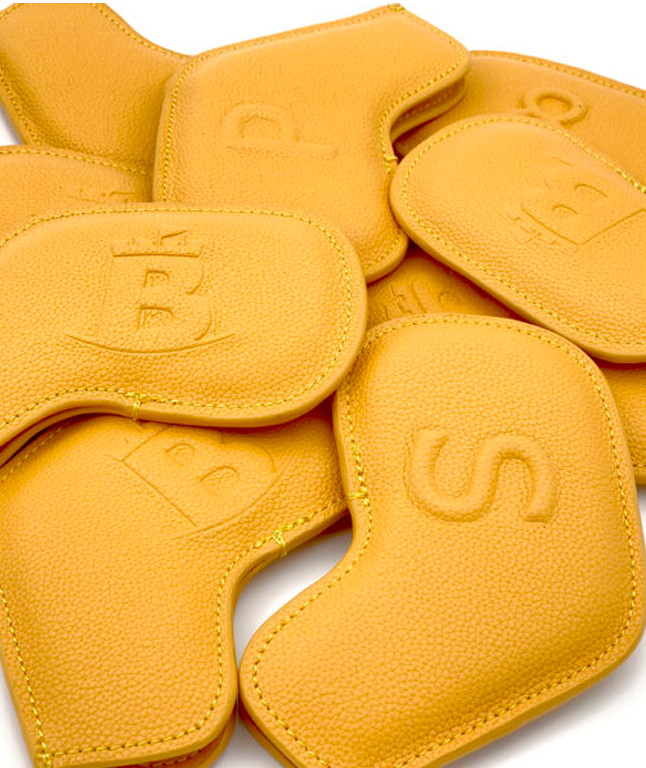 Baron Signature Iron Headcover in yellow made from finest calf leather, showcasing its elegant design and craftsmanship.
