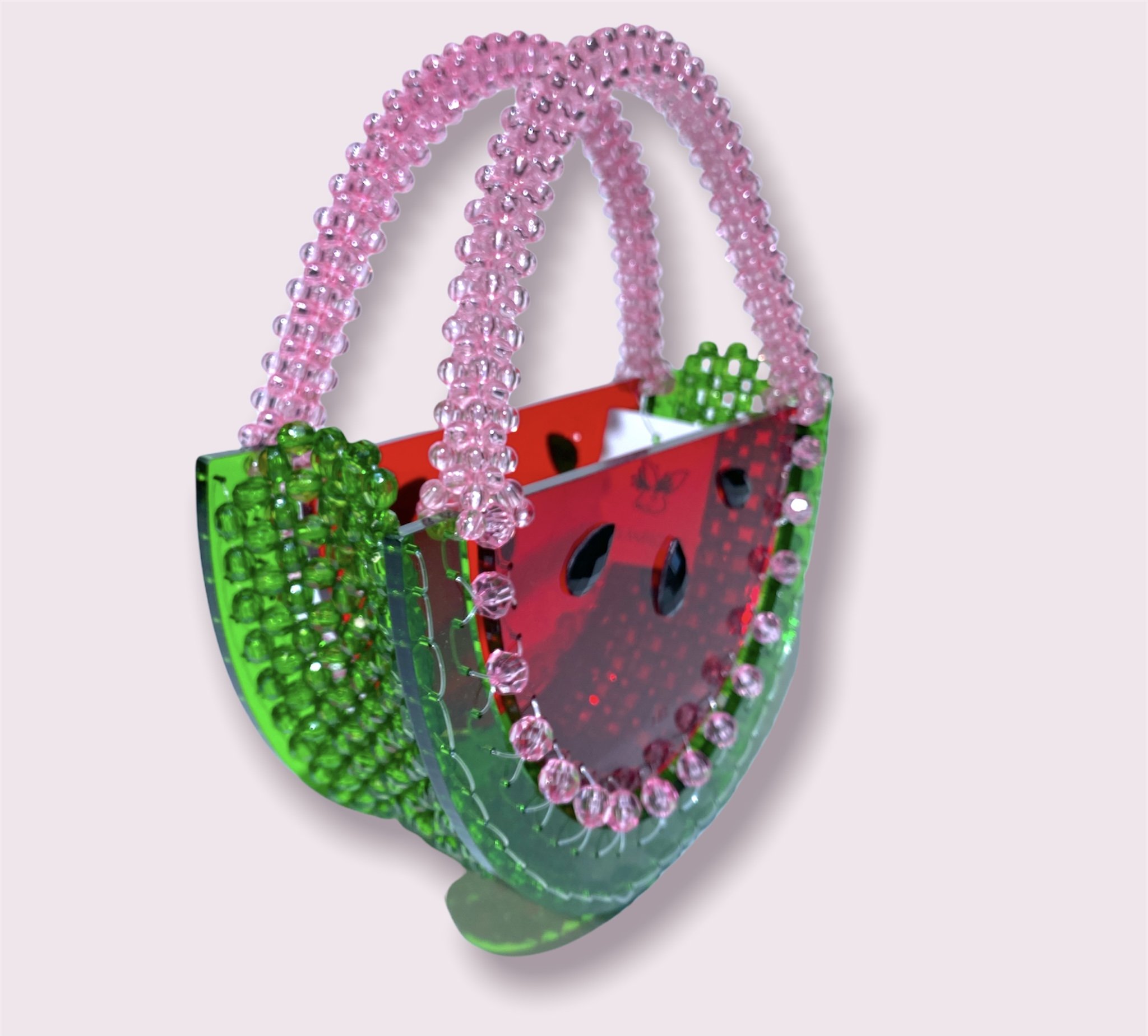 Beautify watermelon handbag featuring a vibrant beaded acrylic design with a 35-inch chain, perfect for summer outings.