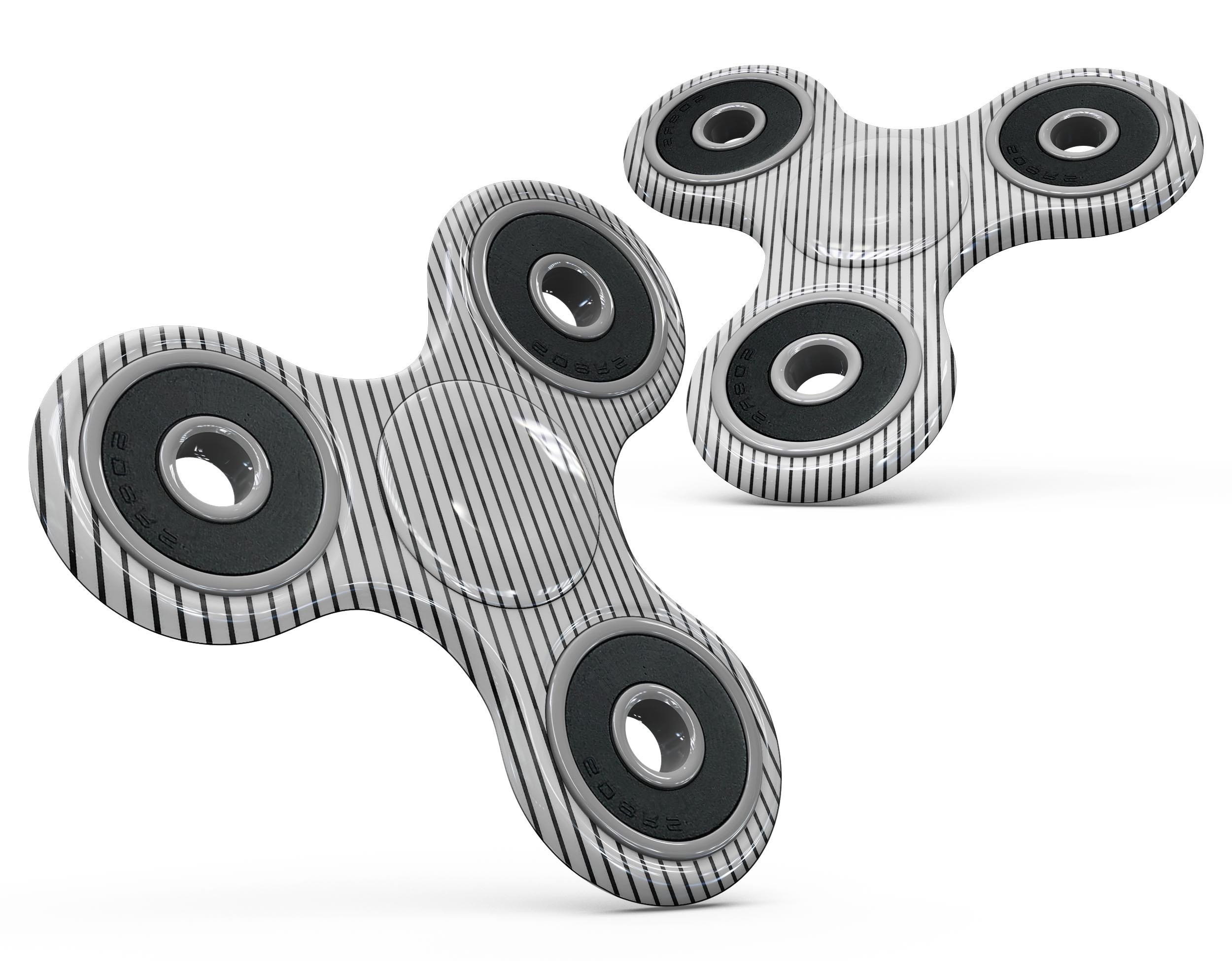 Black and white diagonal stripes fidget spinner skin kit, showcasing a stylish design for personalization and protection.