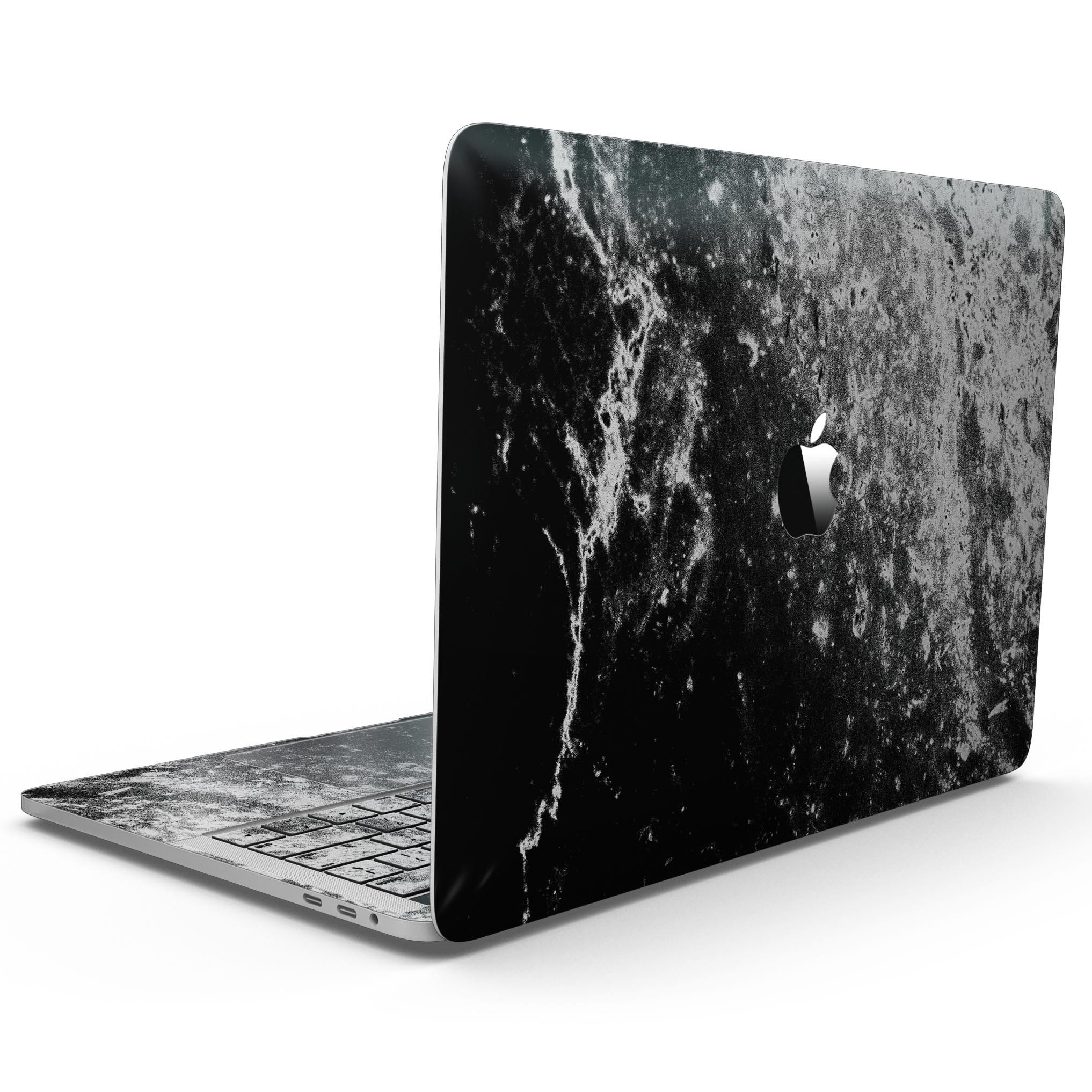 Black and white grungy marble skin for MacBook Pro with Touch Bar, showcasing a stylish design that protects the device.