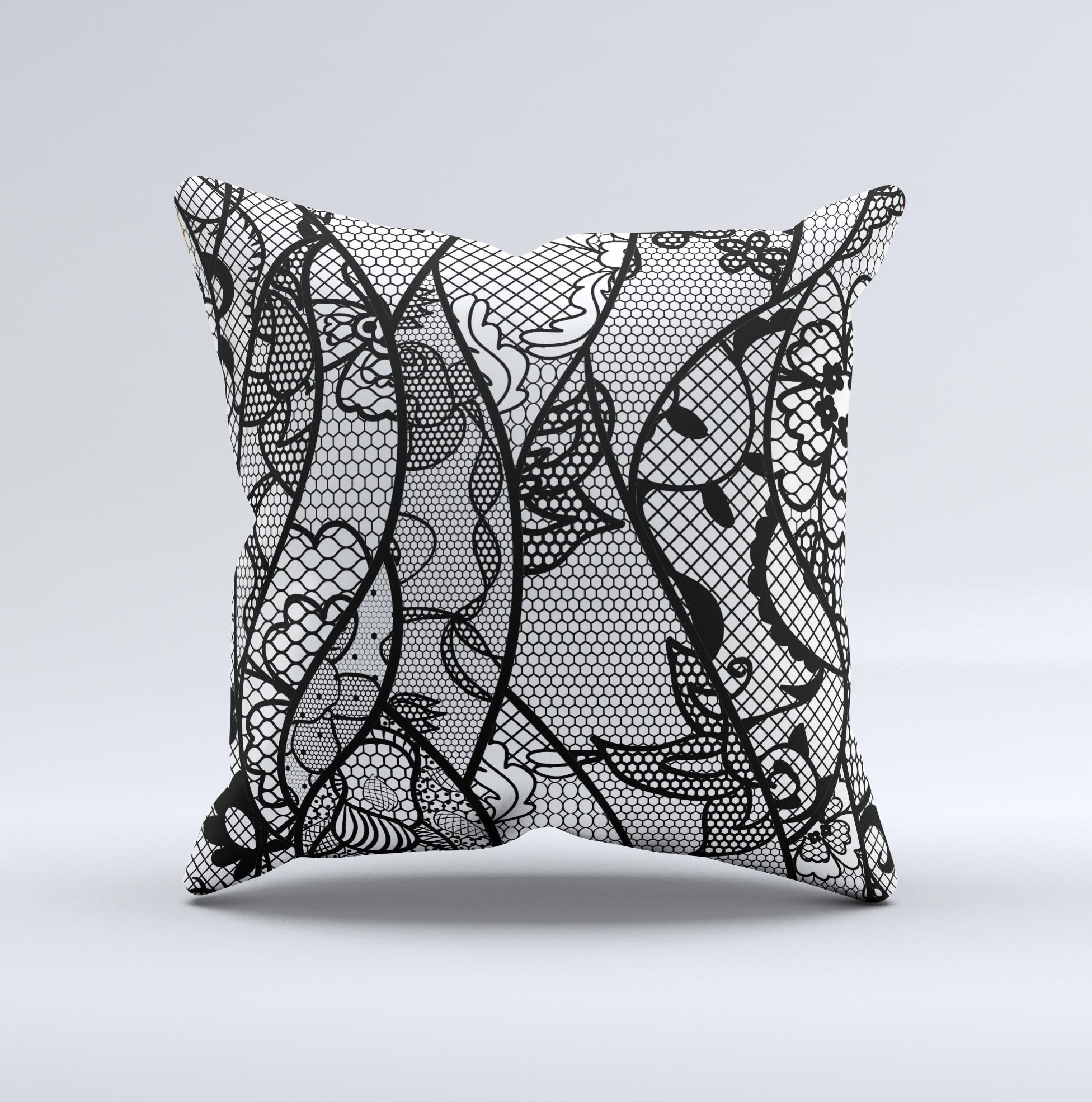 Black and white decorative throw pillow featuring a lace design, handcrafted in Virginia with high thread count fabric and polyester filling.