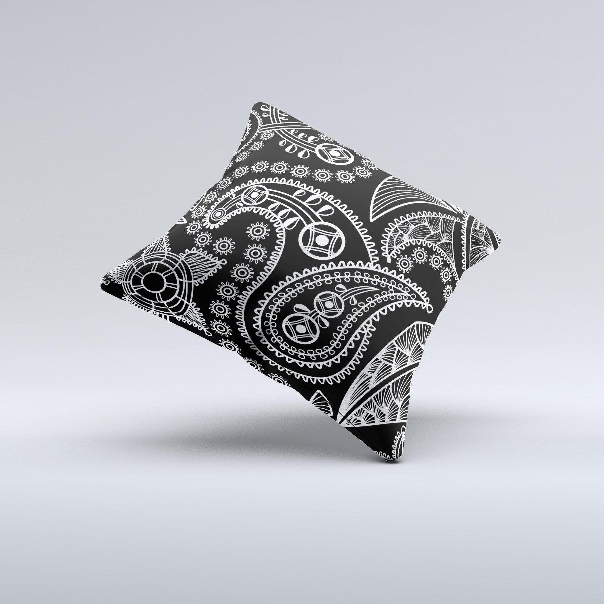 Black and white decorative throw pillow featuring a paisley pattern, handcrafted in Virginia with high thread count fabric.