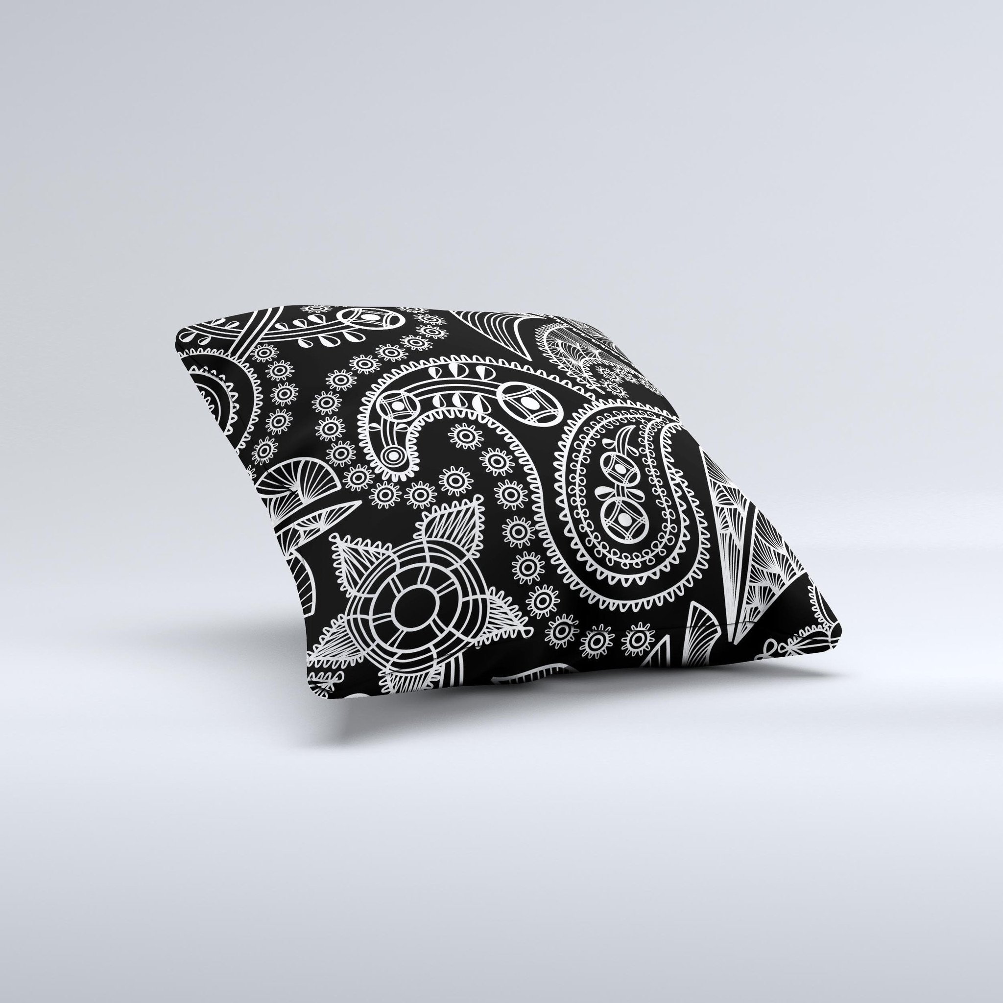 Black and white decorative throw pillow featuring a paisley pattern, handcrafted in Virginia with high thread count fabric.