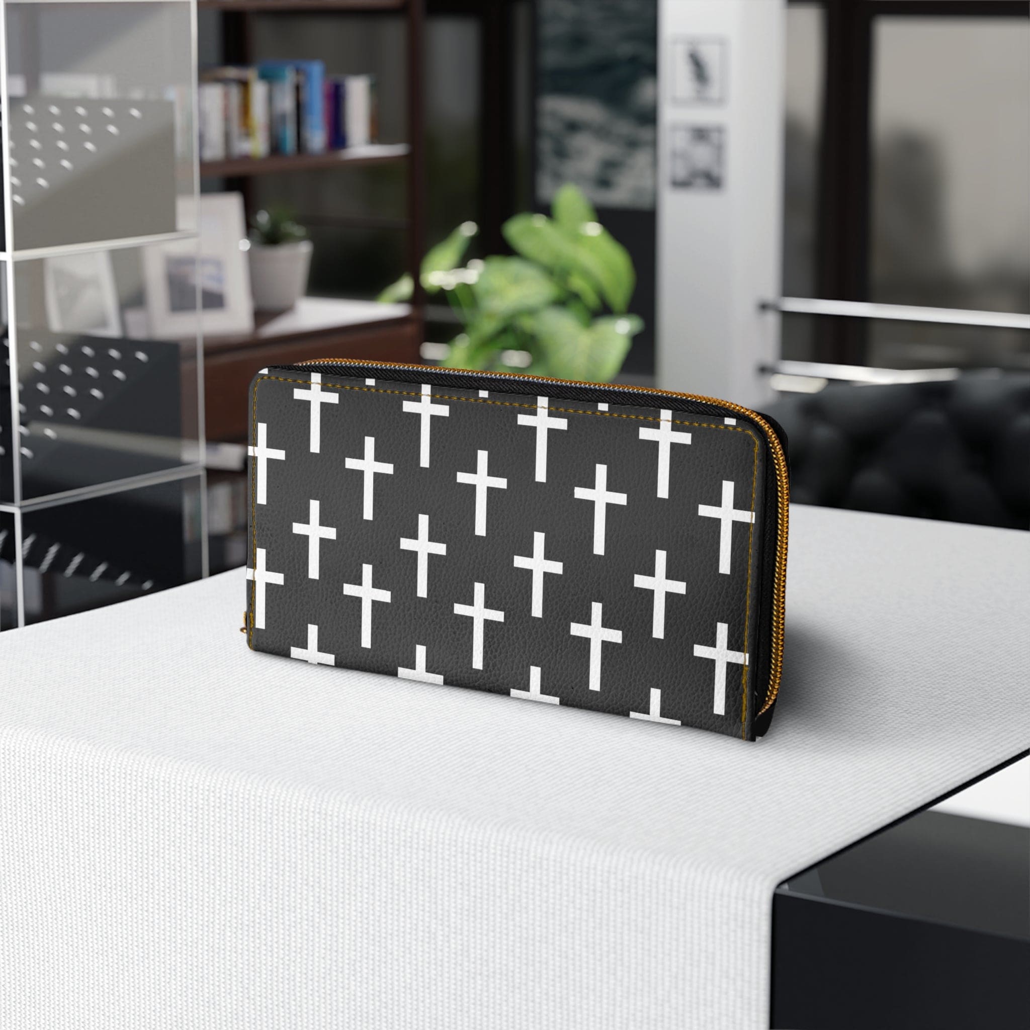 Black and white seamless cross pattern women's zipper wallet clutch showcasing its stylish design and functional compartments.