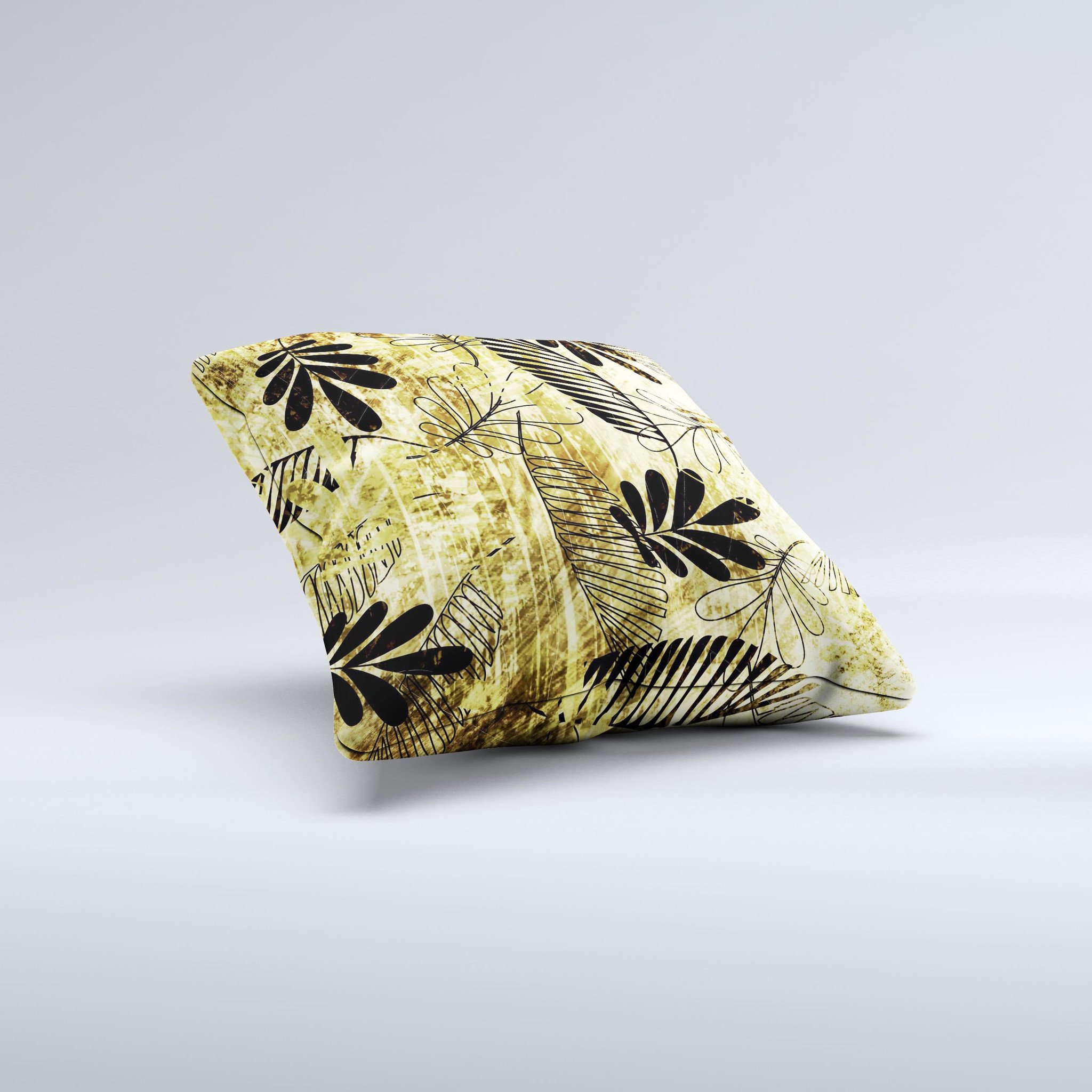 Black and gold decorative throw pillow featuring a grunge leaf design, handcrafted in Virginia with high-quality materials.