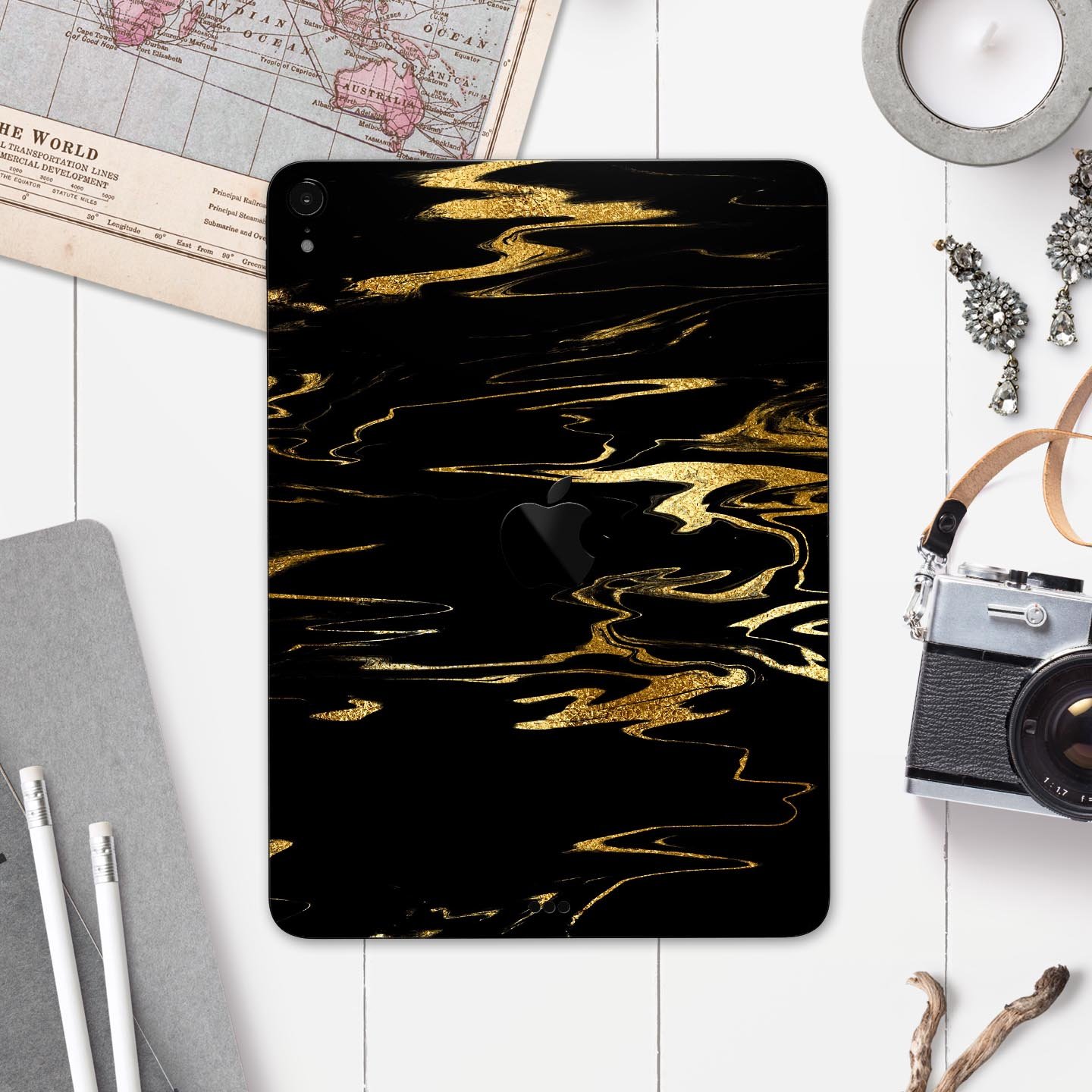 Black & Gold Marble Swirl V2 skin decal for Apple iPad, showcasing a stylish marble design with premium finish.