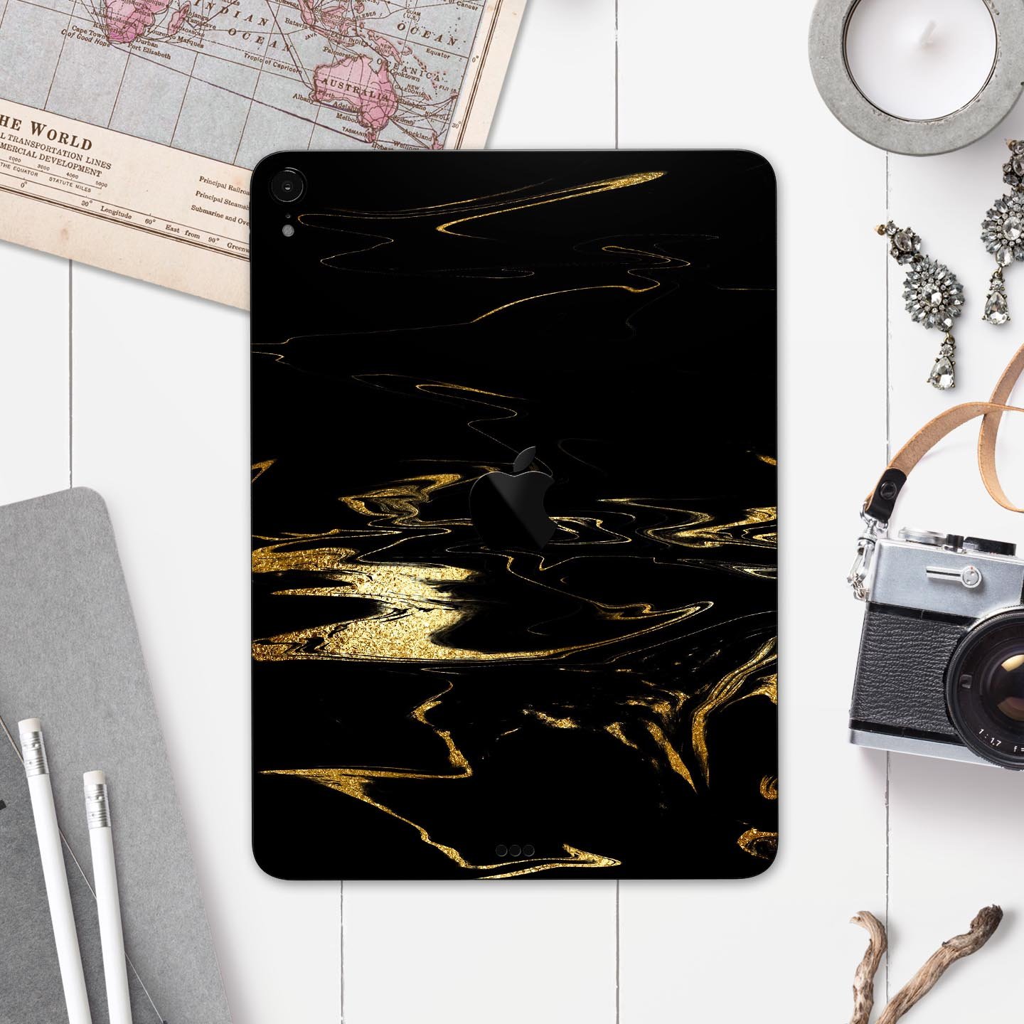 Black & Gold Marble Swirl V9 skin decal for Apple iPad, showcasing a stylish marble design with a glossy finish.