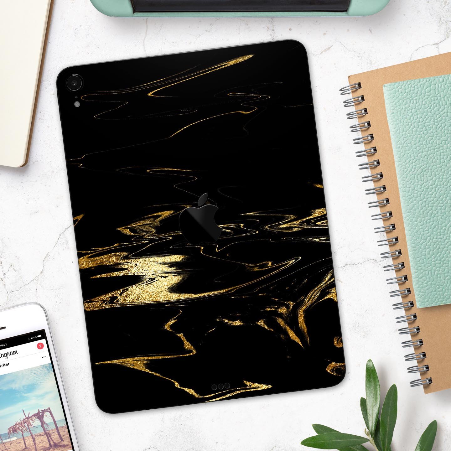 Black & Gold Marble Swirl V9 skin decal for Apple iPad, showcasing a stylish marble design with a glossy finish.