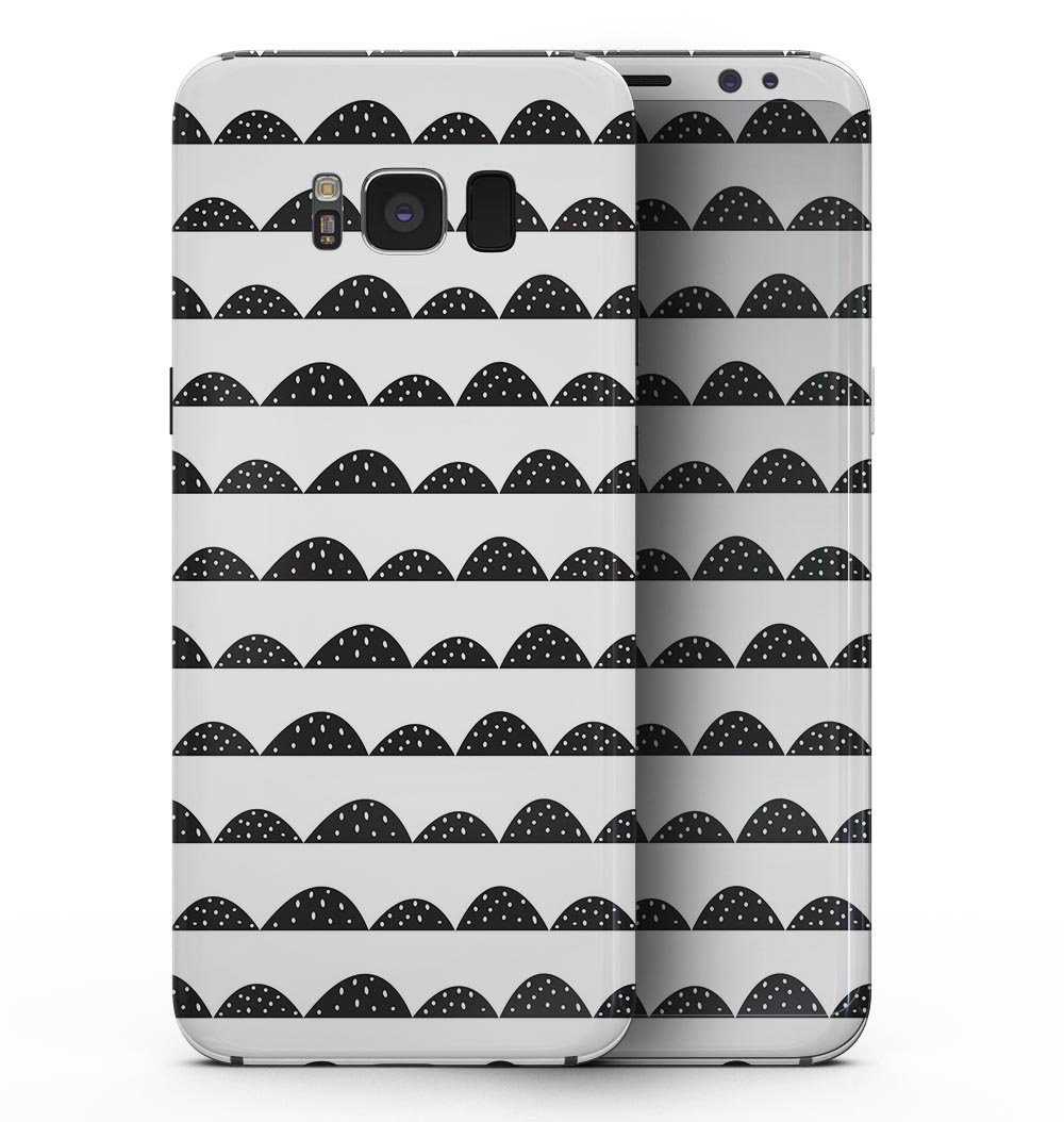 Samsung Galaxy S8 with Black Rolling Hills skin featuring tiny polka dots, showcasing a stylish and protective design.