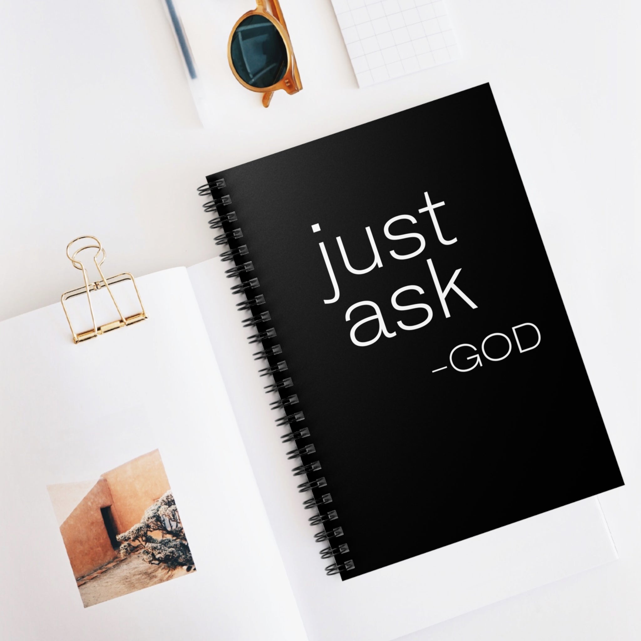 Black Spiral Journal Notebook with 'Just Ask-God' statement on the cover, featuring ruled line pages and a durable design.
